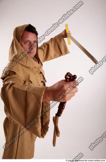 26 2018 01 JOEL ADAMSON MONK WITH CRUCIFIX AND SWORD